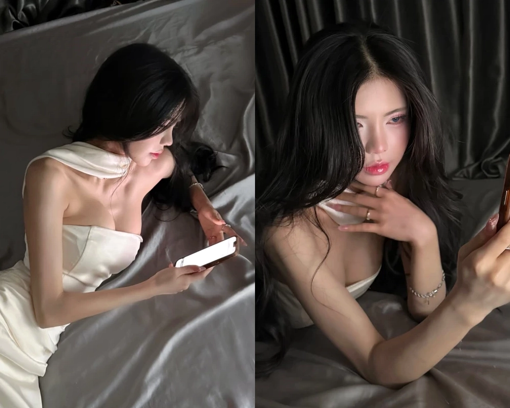 Mai Dora tạo dáng quyến rũ giường